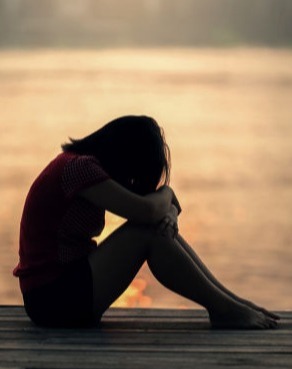 Pissenlit en fleurs Femme triste